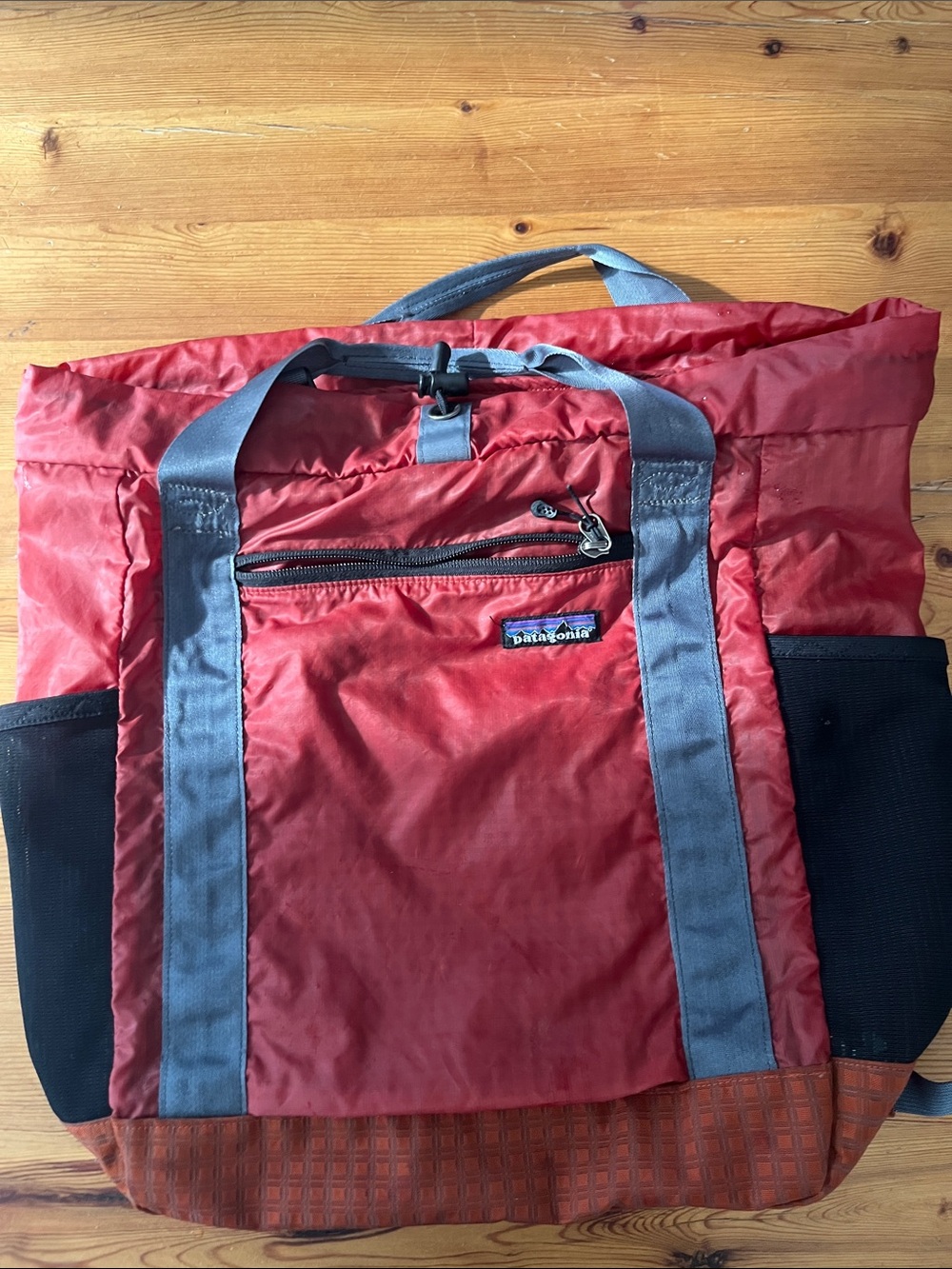Classic Patagonia Red Tote with Gray Straps and Black Pockets